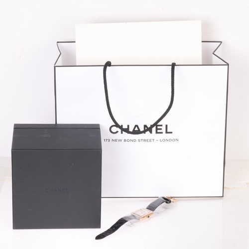 22 - CHANEL - a lady's 18ct beige gold Boy-Friend quartz calendar wristwatch, ref. H4313, purchased April... 