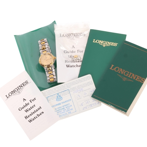 42 - LONGINES - a lady's gold plated stainless steel Flagship quartz calendar bracelet watch, ref. L5.151... 