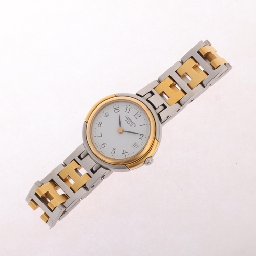 48 - HERMES - a lady's gold plated stainless steel Windsor quartz calendar bracelet watch, ref. 62.03, ci... 