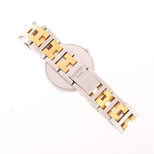 48 - HERMES - a lady's gold plated stainless steel Windsor quartz calendar bracelet watch, ref. 62.03, ci... 