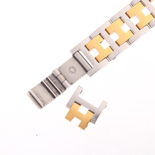 48 - HERMES - a lady's gold plated stainless steel Windsor quartz calendar bracelet watch, ref. 62.03, ci... 