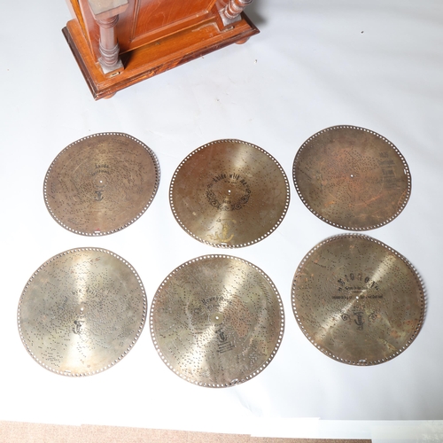 12 - A 19th century Swiss polyphon, penny operated mechanism in floor standing walnut cabinet, Leipzig ma... 