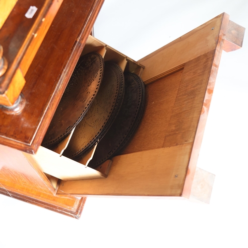 12 - A 19th century Swiss polyphon, penny operated mechanism in floor standing walnut cabinet, Leipzig ma... 