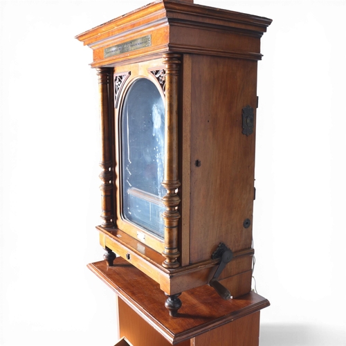 12 - A 19th century Swiss polyphon, penny operated mechanism in floor standing walnut cabinet, Leipzig ma... 