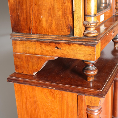 12 - A 19th century Swiss polyphon, penny operated mechanism in floor standing walnut cabinet, Leipzig ma... 