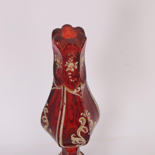 143 - A Bohemian ruby glass Hookah base, with painted and gilded decoration, height 25cm, missing stopper