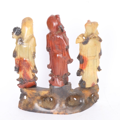 201 - A set of 3 Chinese carved soapstone sage figures, on stand, overall height 25cm
