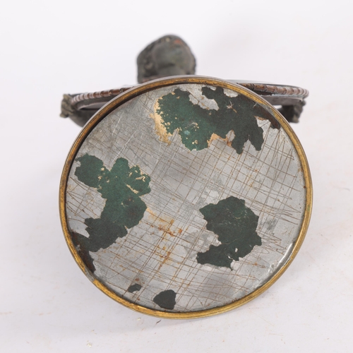 228 - A cold painted metal figure holding a mirror, height 23cm