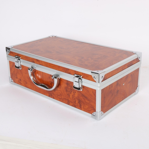 76 - An 8 piece wine accessory set, stainless steel with hardwood handles, in aluminium and faux burr woo... 