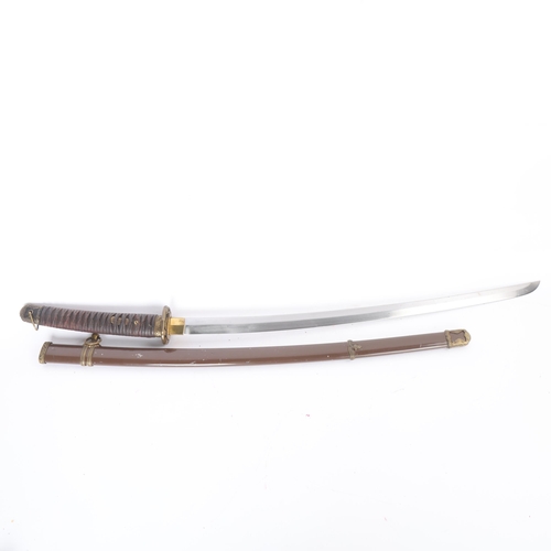 82 - A Japanese Katana sword, mid-20th century, blade length 67cm, original brass-mounted metal scabbard