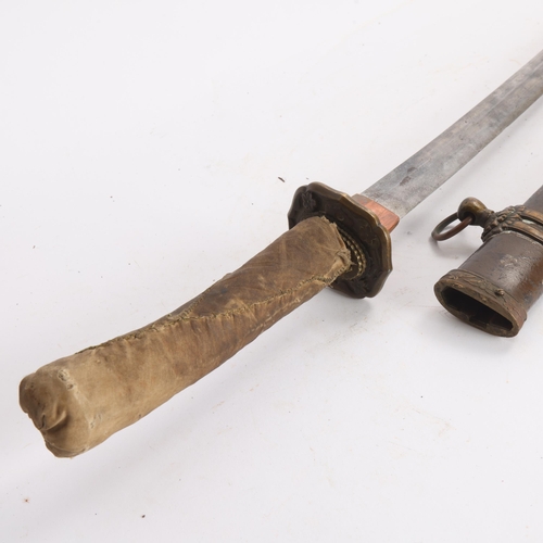 82A - A Second World war period Japanese Wakizashi sword, with leather wrapped grip and bamboo scabbard, l... 