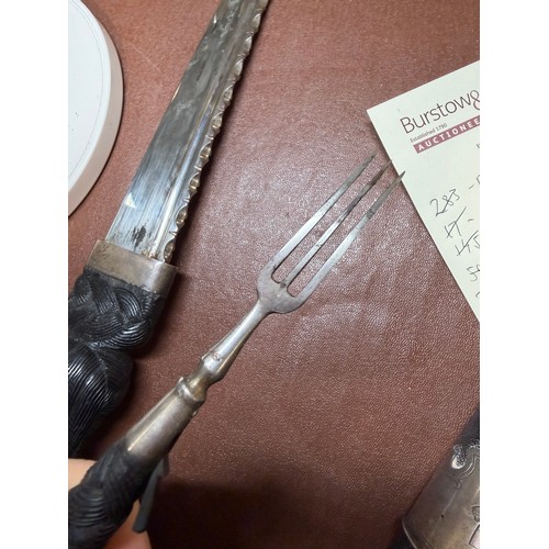 85 - A George V Scottish silver-mounted dirk, with ebonised basket-weave hilt, the pommel set with a cut-... 