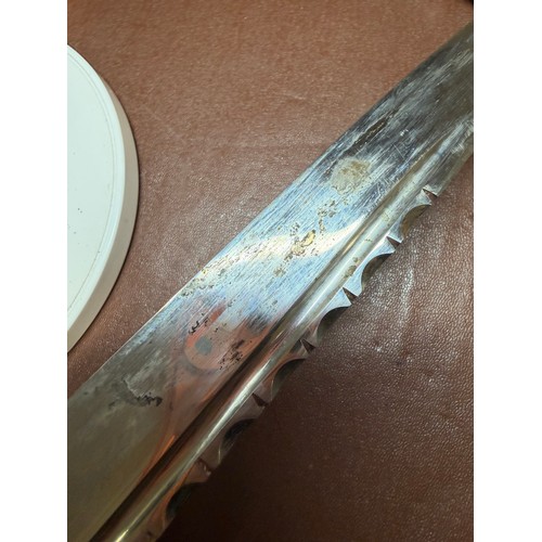 85 - A George V Scottish silver-mounted dirk, with ebonised basket-weave hilt, the pommel set with a cut-... 