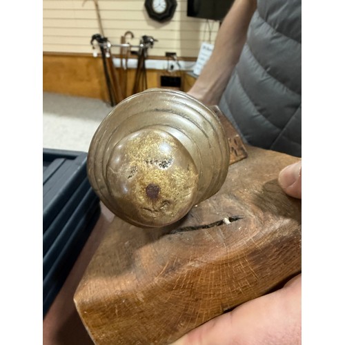 87 - A heavy solid cast-bronze model cannon, on rustic wood stand, barrel length 41cm