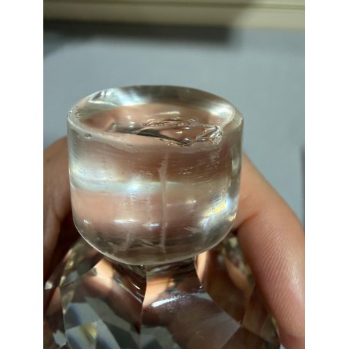 61 - A Victorian oak tantalus with 3 square cut-glass decanters, fold-out lids enclosing 3 liqueur glasse... 