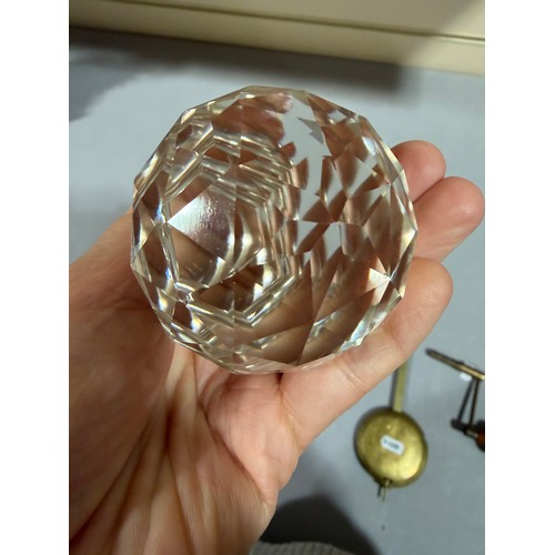 61 - A Victorian oak tantalus with 3 square cut-glass decanters, fold-out lids enclosing 3 liqueur glasse... 