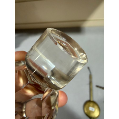 61 - A Victorian oak tantalus with 3 square cut-glass decanters, fold-out lids enclosing 3 liqueur glasse... 