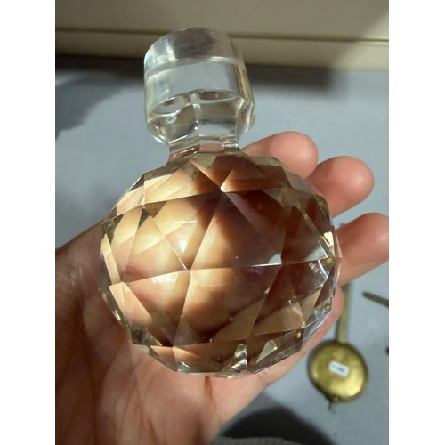 61 - A Victorian oak tantalus with 3 square cut-glass decanters, fold-out lids enclosing 3 liqueur glasse... 