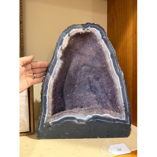 88 - A natural amethyst cavern geode, height 34cm