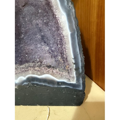 88 - A natural amethyst cavern geode, height 34cm