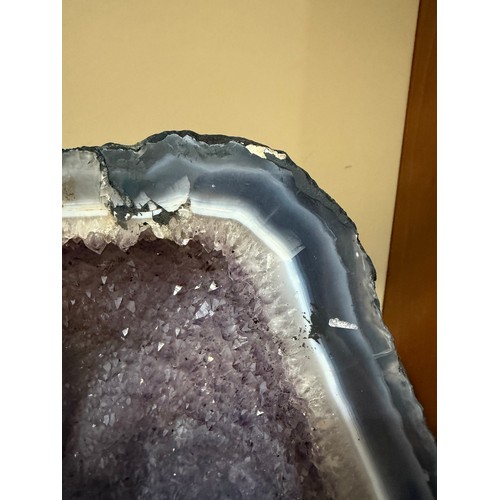 88 - A natural amethyst cavern geode, height 34cm