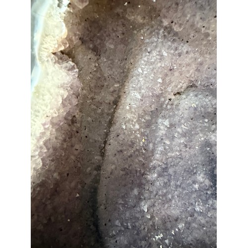 88 - A natural amethyst cavern geode, height 34cm