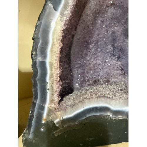88 - A natural amethyst cavern geode, height 34cm