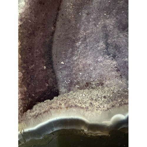 88 - A natural amethyst cavern geode, height 34cm