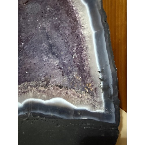 88 - A natural amethyst cavern geode, height 34cm
