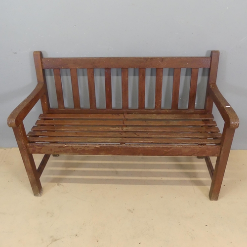 3056 - A vintage stained teak slatted garden bench. Overall dimensions - length 122cm, height 84cm, depth 5... 