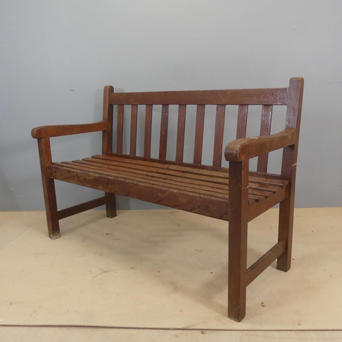 3056 - A vintage stained teak slatted garden bench. Overall dimensions - length 122cm, height 84cm, depth 5... 