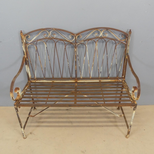 3059 - A weathered and painted cast metal two seat garden bench. Overall dimensions - length 105cm, height ... 