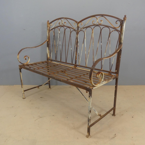 3059 - A weathered and painted cast metal two seat garden bench. Overall dimensions - length 105cm, height ... 