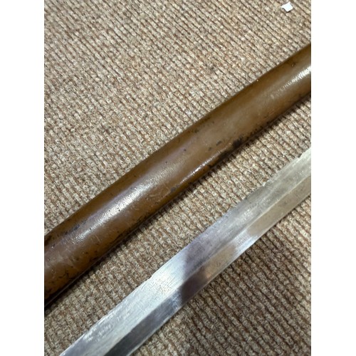 82A - A Second World war period Japanese Wakizashi sword, with leather wrapped grip and bamboo scabbard, l... 
