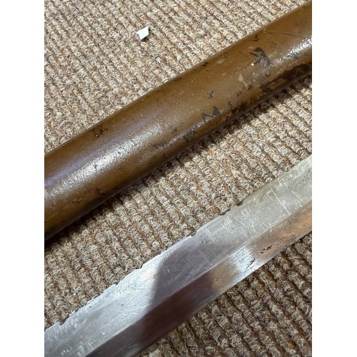 82A - A Second World war period Japanese Wakizashi sword, with leather wrapped grip and bamboo scabbard, l... 