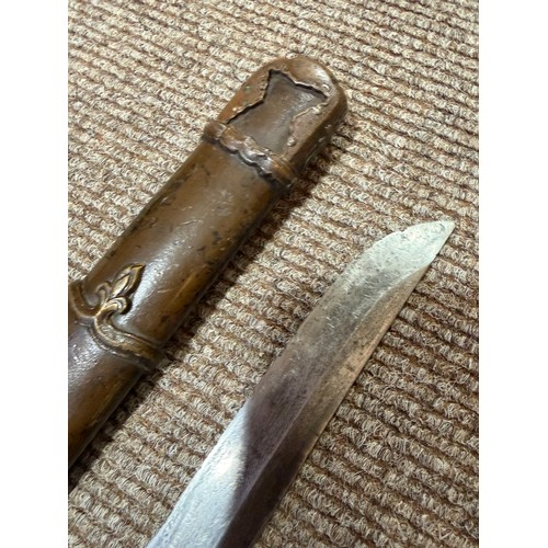 82A - A Second World war period Japanese Wakizashi sword, with leather wrapped grip and bamboo scabbard, l... 