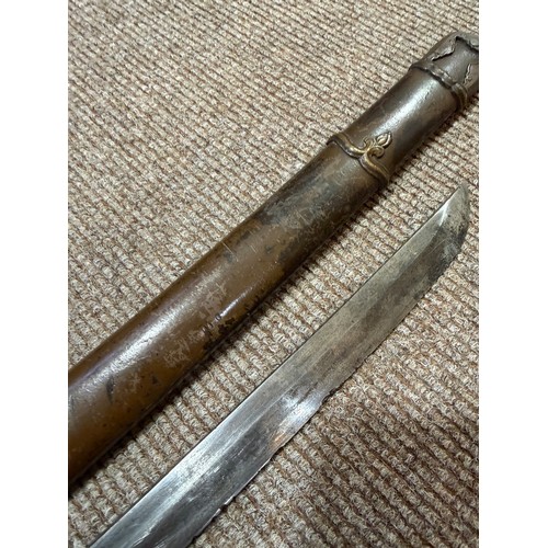 82A - A Second World war period Japanese Wakizashi sword, with leather wrapped grip and bamboo scabbard, l... 