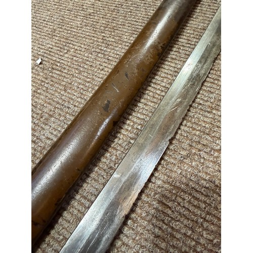 82A - A Second World war period Japanese Wakizashi sword, with leather wrapped grip and bamboo scabbard, l... 