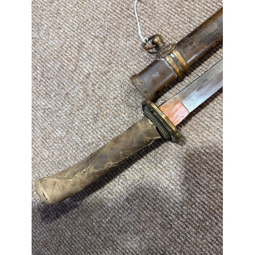 82A - A Second World war period Japanese Wakizashi sword, with leather wrapped grip and bamboo scabbard, l... 