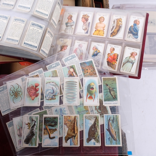 119 - A large quantity of Vintage postcards (1 large boxful)