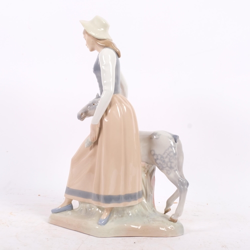 132 - Zaphir (Lladro) porcelain figure, Feeding My Colt, model no. 584, H40cm