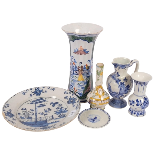 137 - A group of Delft pottery, including a large vase with flared rim, H28cm