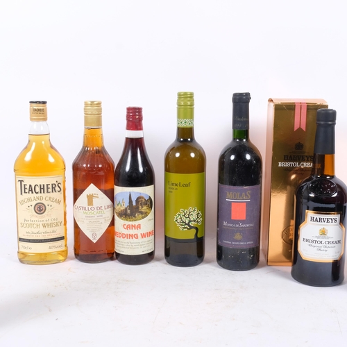 148 - 10 bottles of various wine and spirits, including a Teachers Scotch Whisky, Cana Wedding Wine, Casti... 