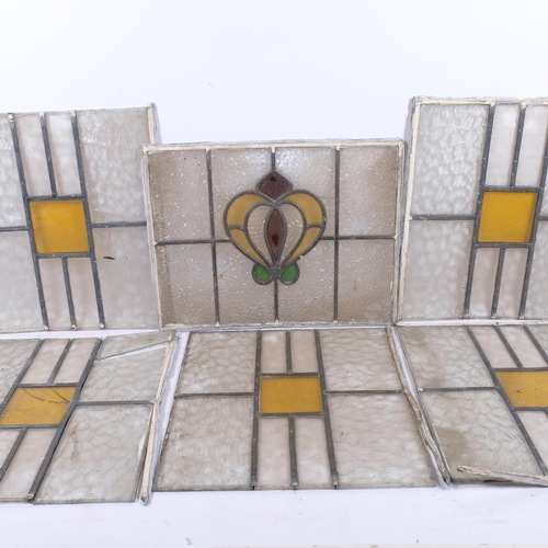 151 - A large collection of Vintage stained glass leadlight window panels