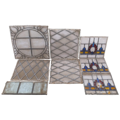 151 - A large collection of Vintage stained glass leadlight window panels