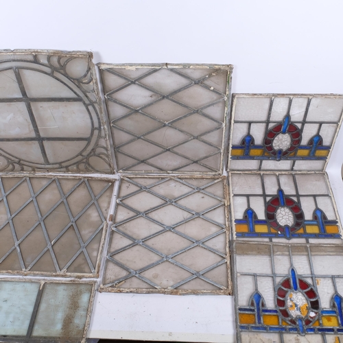 151 - A large collection of Vintage stained glass leadlight window panels