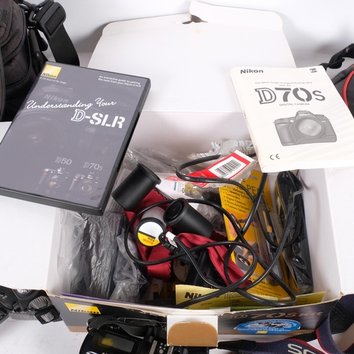212 - A Nikon D70s digital camera, in softshell case, a Canon EOS500 camera, and tripod in bag