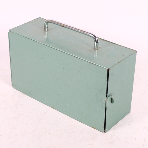223 - A Vintage painted metal storage case, the interior fitted with shelves of tins, L30cm
