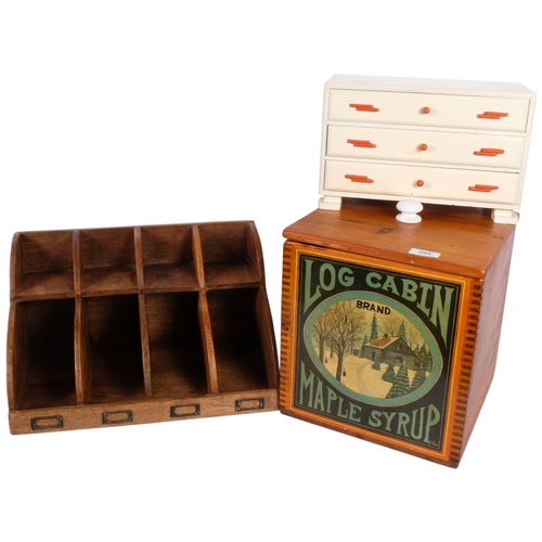 299 - A stained wood letter rack, a painted wood jewel chest, and a pine advertising storage bin (3)