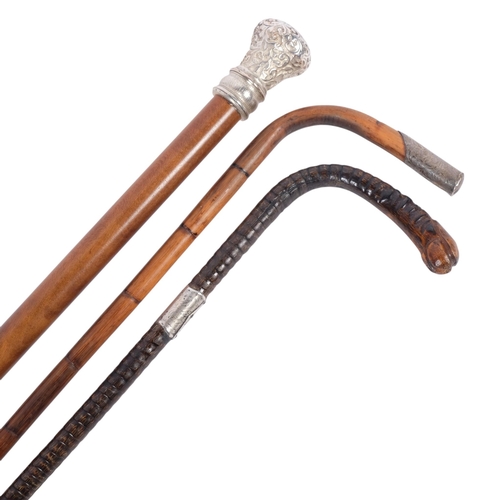 303 - 2 walking canes with silver mounts, and an Indian cane with plated top
